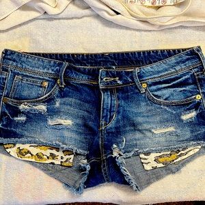 Denim shorts! With leopard showing pockets. Super short, very comfy! Low rise